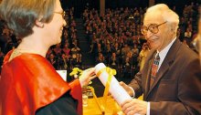 Receiving an Honorary degree in Sacred Theology from Fribourg University, Switzerland, 2004.